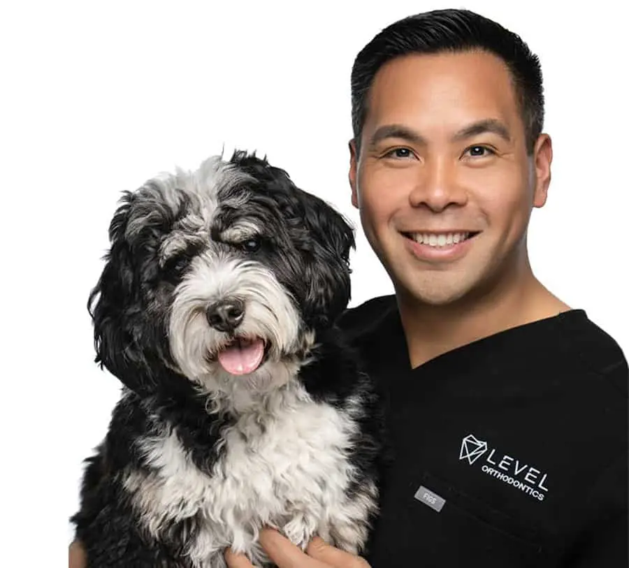 Dr. Mark with dog - Level Orthodontics